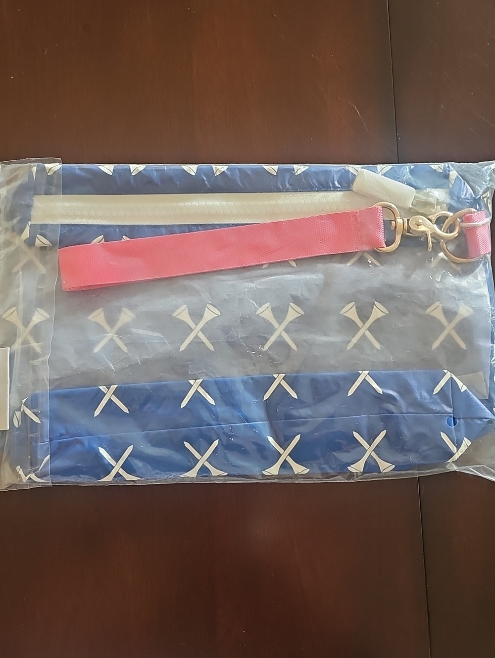 Birdiegirl Clear Wristlet Clutch with Blue Golf Tee Pattern and Pink Strap